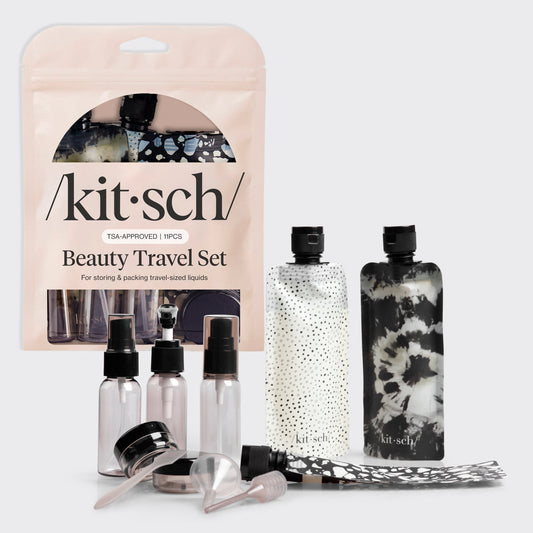 Kitsch Black & Ivory Travel Bottles 11pc Set laid out showing all pieces including bottles, jars, and spray