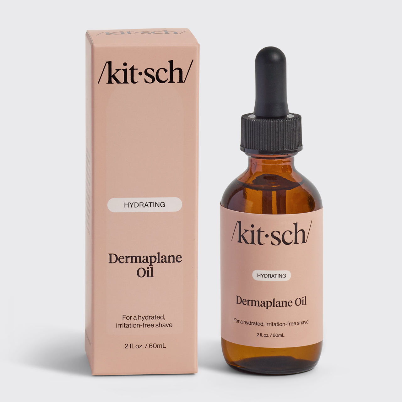 Kit-sch Dermaplane Oil bottle and packaging on a light gray background