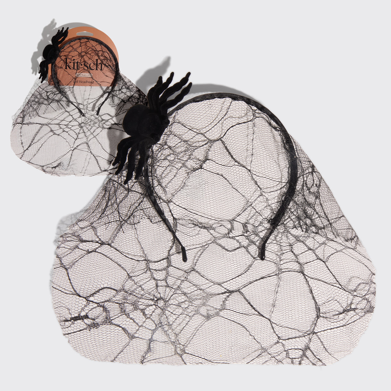 KITSCH Spiderweb Veil Headband — hero product shot of intricate spiderweb lace veil headband — bold Halloween accessory for a fashion-forward finish