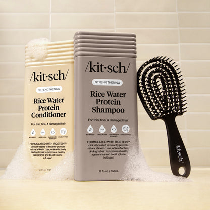KITSCH Rice Water Protein Liquid Shampoo & Conditioner with Mini Detangling Flexi Brush — product trio flat lay — strengthens and smooths hair — part of the Ultimate Shower Bundle
