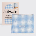 Kitsch XL Hair Towel Wrap in blue gingham and bow print, folded to show the soft microfiber fabric and embroidered elastic loop closure