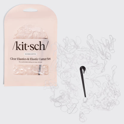 KITSCH No-Snag Elastics 200pcs & Recycled Plastic Elastic Cutter Set — hero shot of the clear no-snag elastics with the black elastic cutter — 200 damage-free elastics in three sizes plus a reusable cutter — gentle hold that won't snag or crease hair