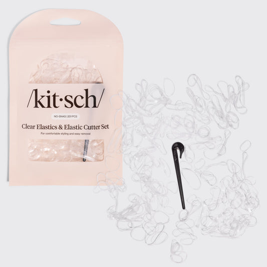 KITSCH No-Snag Elastics 200pcs & Recycled Plastic Elastic Cutter Set — hero shot of the clear no-snag elastics with the black elastic cutter — 200 damage-free elastics in three sizes plus a reusable cutter — gentle hold that won't snag or crease hair