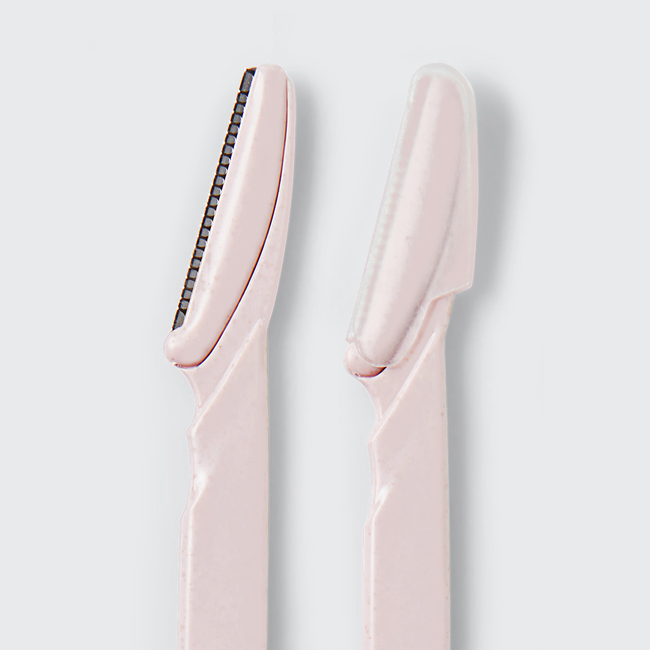KITSCH Eco-Friendly Dermaplaner 12-pack in blush — product flat lay — wheat straw handle dermaplaner for gentle facial exfoliation — included FREE in bundle