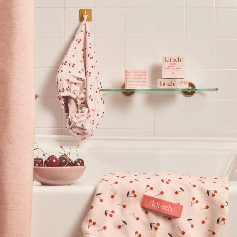 KITSCH Cleansing Tart Cherry Solid Body Wash — animated lifestyle product shot — Infused with a refreshing scent reminiscent of tart black cherries — made in the USA, Vegan, Cruelty Free, Leaping Bunny Certified