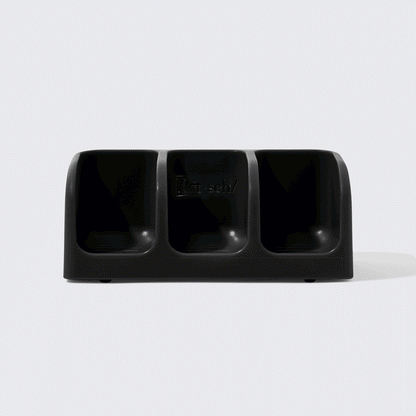 BuildYourOwnBundle-SoapDish-Black GIF showing dry bars being stacked on the soap dish.